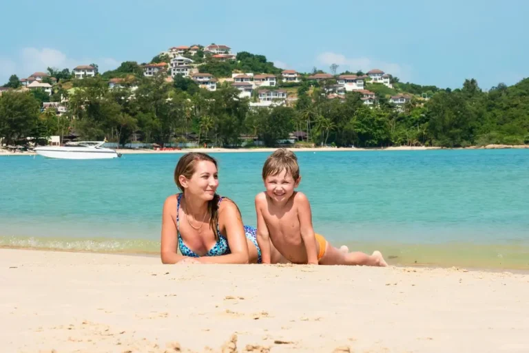 intrepid-travel-thailand-koh-samui-island-family-mother-son-beach-shutterstock-727106386